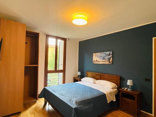 Ένα ή περισσότερα κρεβάτια σε δωμάτιο στο B&B LE AMARENE