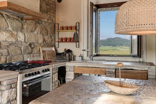 Η κουζίνα ή μικρή κουζίνα στο Tuscany Forever Premium Apartments