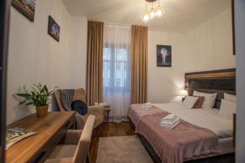 Postel nebo postele na pokoji v ubytování Hotel Sukcesor