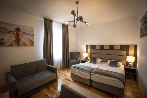 Postel nebo postele na pokoji v ubytování Hotel Sukcesor