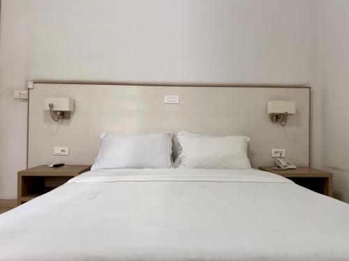 Un pat sau paturi într-o cameră la Residence ACHENBACH