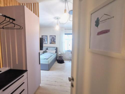 a room with a door open to a living room at Der schönste Platz in der Altstadt in Amberg