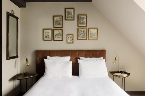 Кровать или кровати в номере New Hotel Republique - Ex Albert's Hotel
