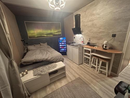 Postel nebo postele na pokoji v ubytování Brand New Studio Apartment in Tromso - hotspot