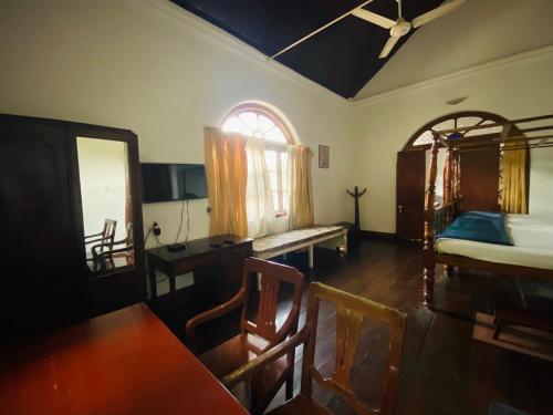 Katil atau katil-katil dalam bilik di Ballard Bungallow