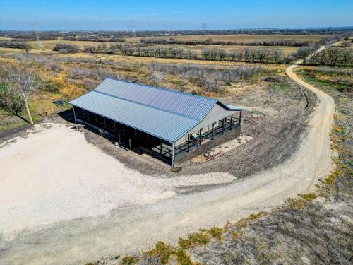 an overhead view of a building in a field at Coyote Creek Ranch in Martindale