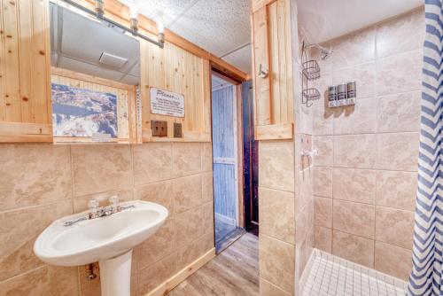 a bathroom with a sink and a shower at 10 Renovated Dog Friendly Cozy Room Leadville in Leadville