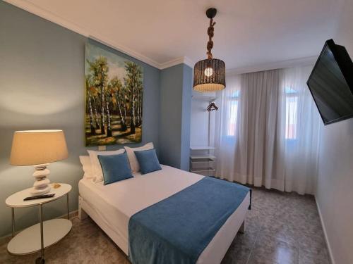 Posteľ alebo postele v izbe v ubytovaní Vintage & Deluxe Apartments