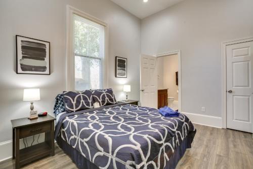a bedroom with a bed and a window at 2 Mi to French Quarter Walkable NOLA Home in New Orleans