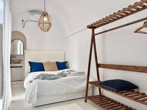 Zina Apartment à Sidi Bou Saïd tesisinde bir odada yatak veya yataklar
