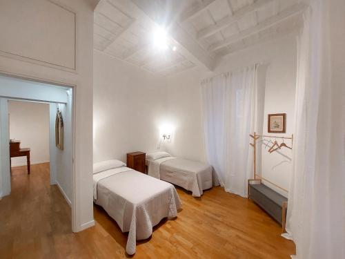 En eller flere senger på et rom på pantheon luxury apartment