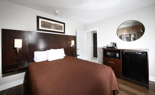 Kuchyň nebo kuchyňský kout v ubytování Cedar Lodge Motel