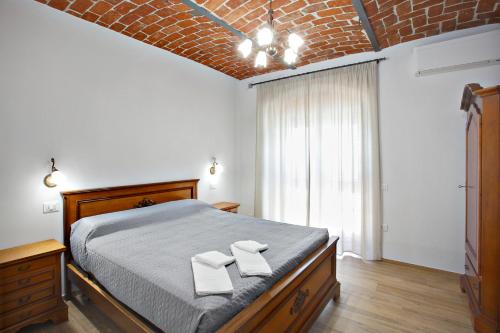 Säng eller sängar i ett rum på Casale Gioia