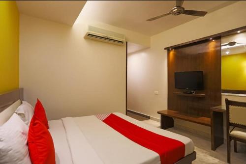 Voodi või voodid majutusasutuse Abhi Residency Hotel toas