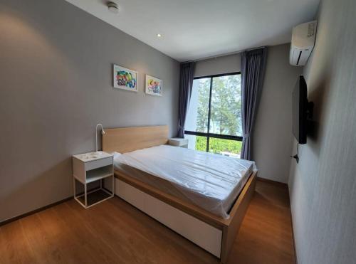 Postel nebo postele na pokoji v ubytování The Title condominimum