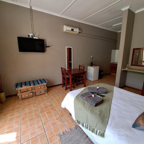 Morgenbos Guesthouseにあるテレビまたはエンターテインメントセンター