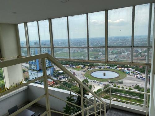 a view from the top of a building at Tamansari Mahogany Apartment By Sagita Residence Karawang in Karawang