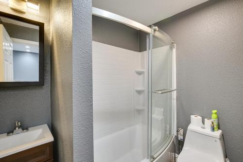 a bathroom with a shower and a toilet and a sink at Hidden Gem in Hawthorne about 3 Mi to SoFi Stadium in Hawthorne