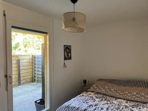 Llit o llits en una habitació de Appartement Style Loft/Lumineux