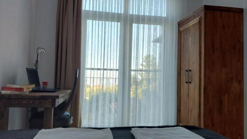 Ένα ή περισσότερα κρεβάτια σε δωμάτιο στο Seron Mountain House