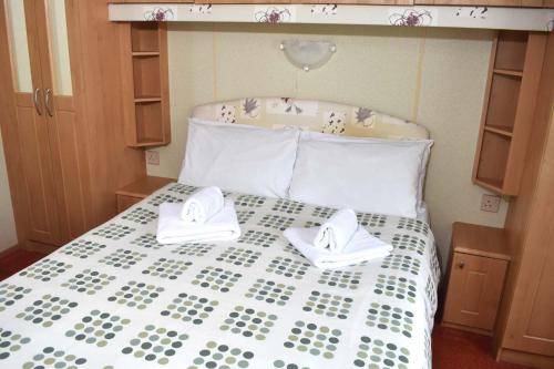 Postel nebo postele na pokoji v ubytování Prestige Bronze LC23