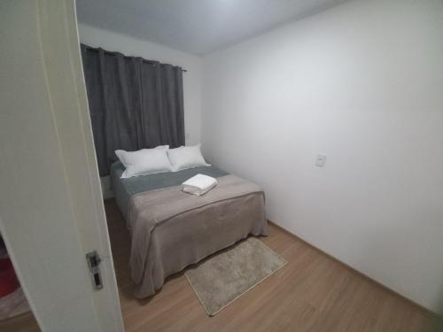 Postel nebo postele na pokoji v ubytování Recanto Do Barbosa Campos do Jordão