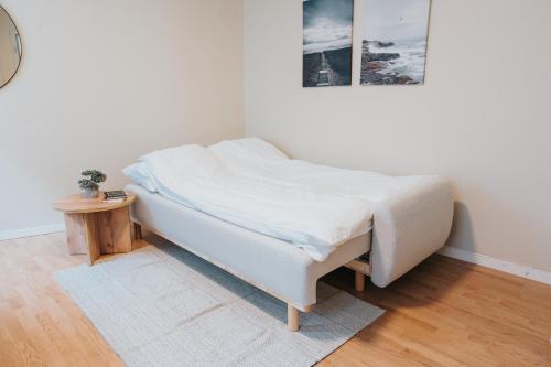 Postel nebo postele na pokoji v ubytování Nygaardsgaten