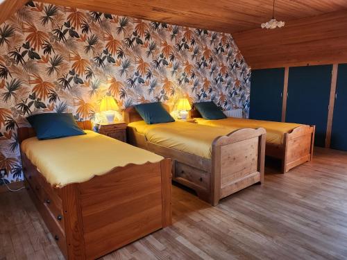 Postel nebo postele na pokoji v ubytování Gîte REVILLE 6/7 personnes, à 900 m de la mer