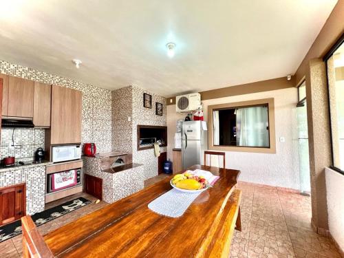 Η κουζίνα ή μικρή κουζίνα στο CASA P/ TEMPORADA - VILAGE, CAPÃO NOVO