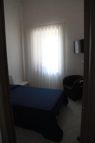 Postel nebo postele na pokoji v ubytování Casa corrado
