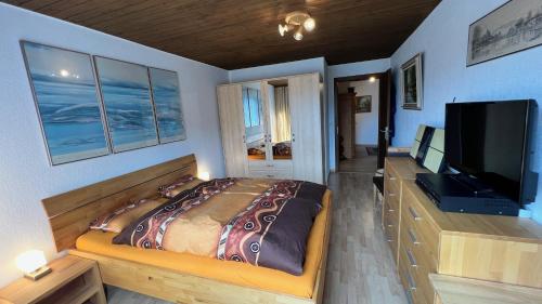 Postel nebo postele na pokoji v ubytování Alpenblick Loft neben Skilift in Amden Arvenbüel