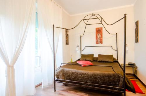 Postel nebo postele na pokoji v ubytování Albergo Villa Gaia