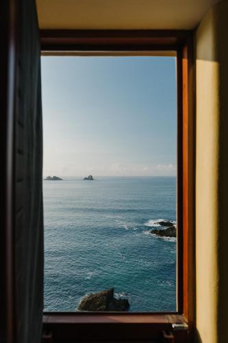 a view of the ocean from a window at Cala de Mar Resort & Spa Ixtapa in Ixtapa