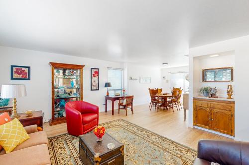 a living room with a couch and a table at Hazel Eyes in Nipomo
