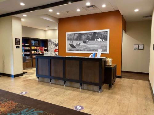 a lobby of a store with a reception desk at Hampton Inn & Suites Tampa Northwest/Oldsmar in Oldsmar
