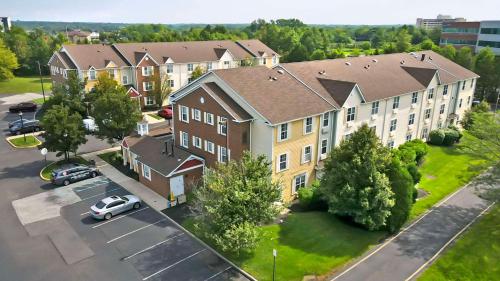 an overhead view of a large apartment building with a parking lot at MainStay Suites Mt Laurel - Philadelphia in Mount Laurel