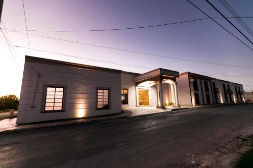 a building on the side of a street at Hotel Los Frailes, Valladolid, Yucatán in Valladolid