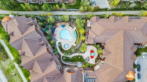 an overhead view of a house with a pool at Stoneridge Mountain Resort in Canmore