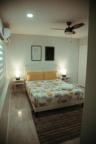 Ένα ή περισσότερα κρεβάτια σε δωμάτιο στο VillaBella