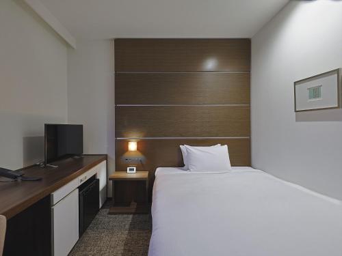 Katil atau katil-katil dalam bilik di JR Kyushu Hotel Kagoshima