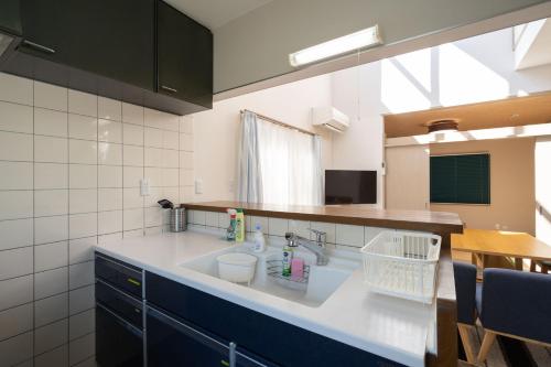 a kitchen with a sink and a counter at S-villa Nasu 11th in Nasu
