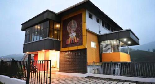 a building with a teddy bear painted on it at Hill Monk - Bethany Heights in Vagamon