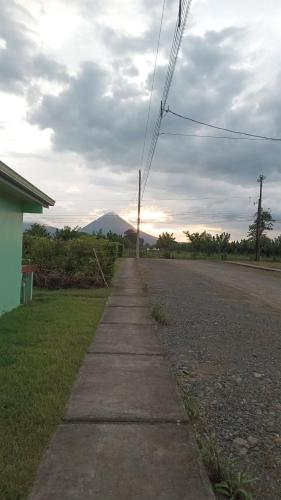 an empty road with a mountain in the distance at Villa Bonita in Tanque