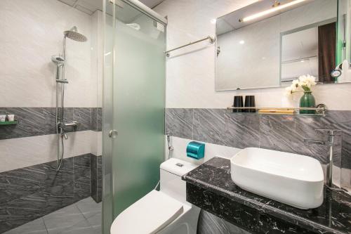 Koupelna v ubytování Tunger Grand Hotel