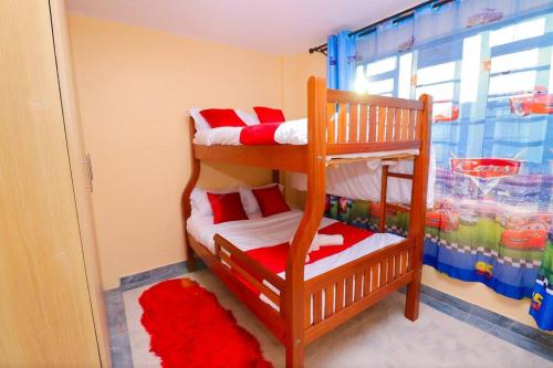 Ένα ή περισσότερα κρεβάτια σε δωμάτιο στο StayBridge Pent House