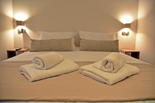 Letto o letti in una camera di Kleodora Apartments
