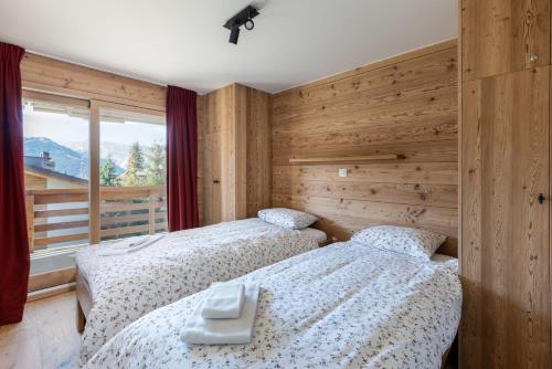 מיטה או מיטות בחדר ב-Apartment Olympus