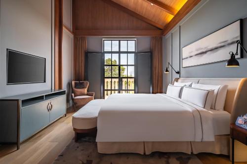 Melia Shanghai Parksideにあるベッド
