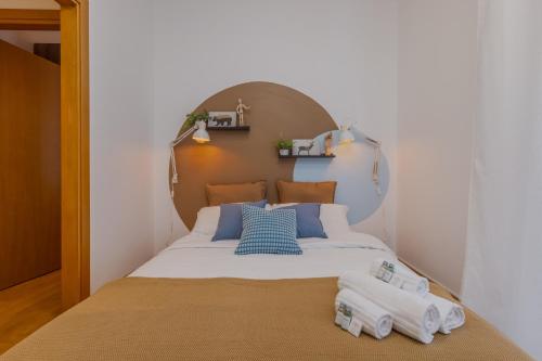 Postel nebo postele na pokoji v ubytování Nordic Style - 5 min dall'Arena & Parcheggio