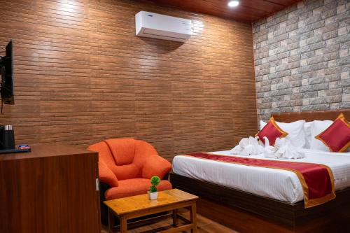 Postel nebo postele na pokoji v ubytování JHARNA RESORT